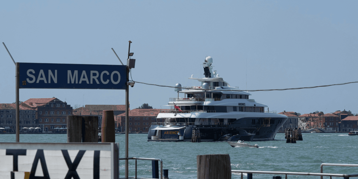 The yacht Arience is moored in front of St. Mark's Square in Venice, Italy, on Wednesday, June 25, 2025, ahead of festivities in the lagoon city reportedly linked to a wedding celebration for Jeff Bezos and Lauren Sánchez. (AP Photo/Luca Bruno)
