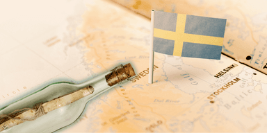 Glasflaska med gammalt meddelande, hittad på Torsö i Väderöarnas skärgård i Sverige.