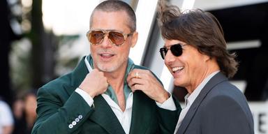 Brad Pitt och Tom Cruise på röda mattan. En ny studie visar att coolhet ofta kopplas till energi, nyfikenhet och självständighet.