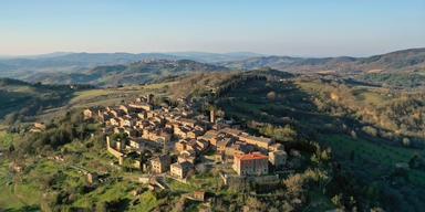 Flytta till italienska Radicondoli.