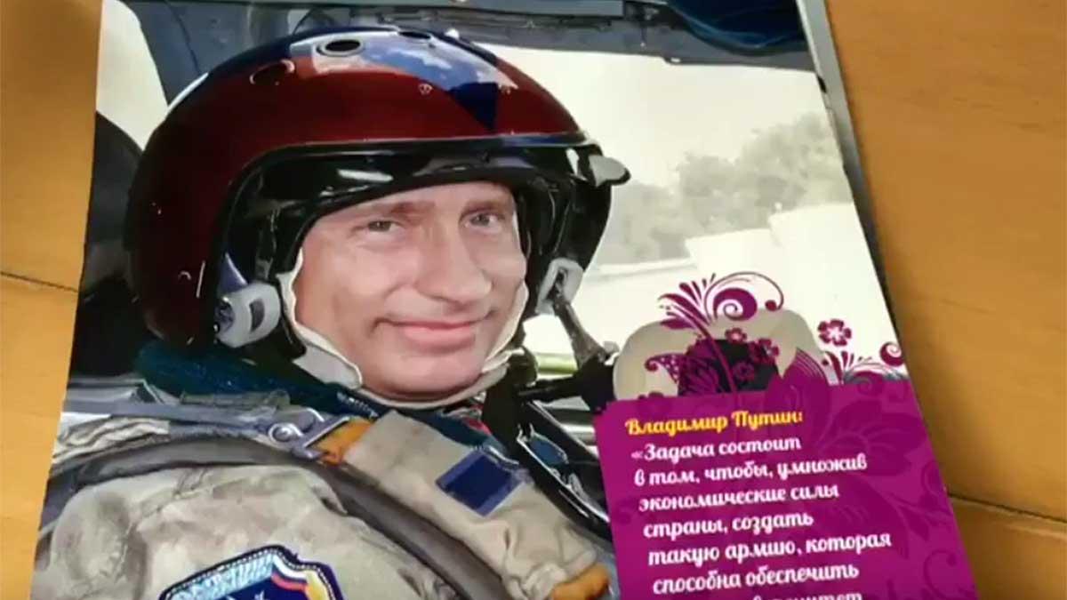 Rysslands ledare Vladimir Putin som stridspilot i 2017 års kalender. (Skärmdump från Youtube)