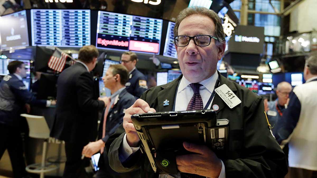 New York-börsen hade en svängig dag på onsdagen med rejäla nedgångar vid öppningen på oro för eskalerat handelskrig med Kina
