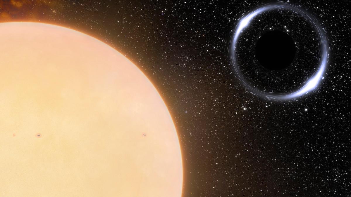 En illustration som visar det svarta hål som ligger närmast jorden och dess solliknande följeslagsstjärna. Svarta hål är så kallade singulariteter där våra nuvarande fysiska lagar inte fungerar.