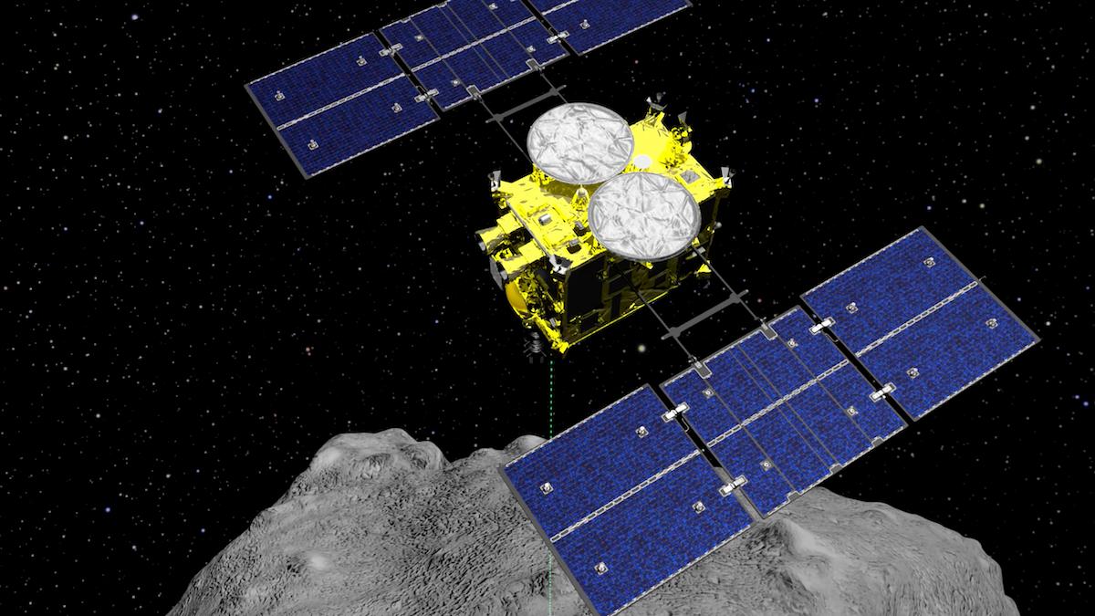 Datagrafik som visar rymdsonden Hayabusa2 ovanför asteroiden Ryugu, där den har samlat in prover som den fört till Jorden för analys