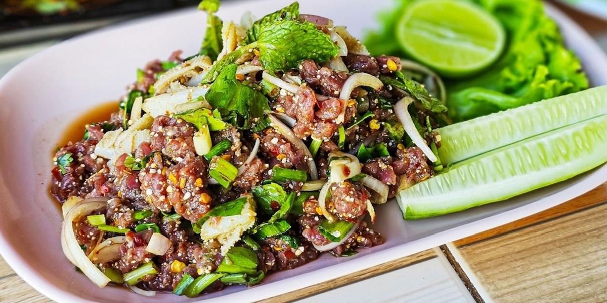 Thailändsk Koi plaa, rå fisk, orsakar levercancer med dödlig utgång.